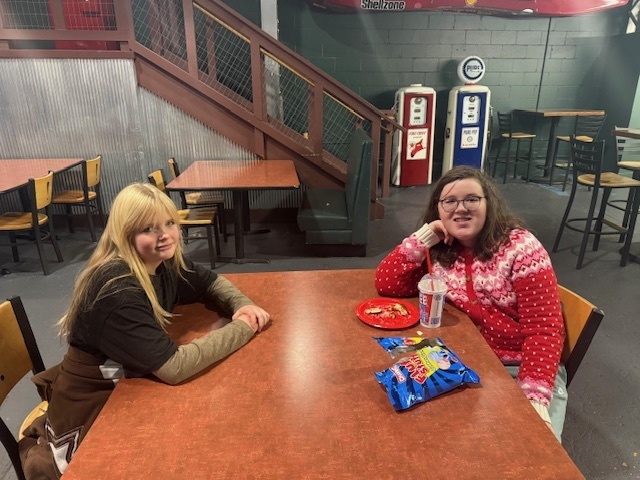 two students sitting at a table