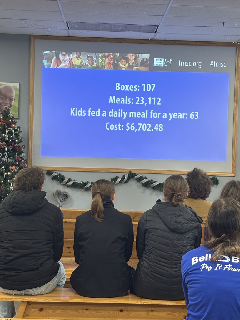 words on screen: Boxes: 107, Meals, 23,112,  Kids fed a daily meal for a year: 63, Cost: $6702.48