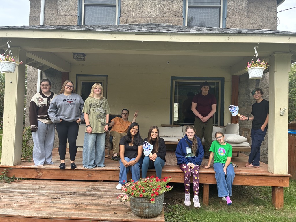 students on a front porch