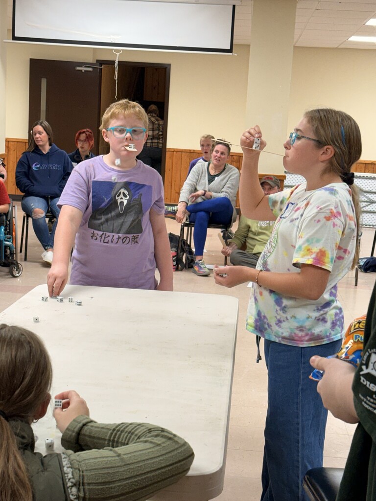 students stacking dice