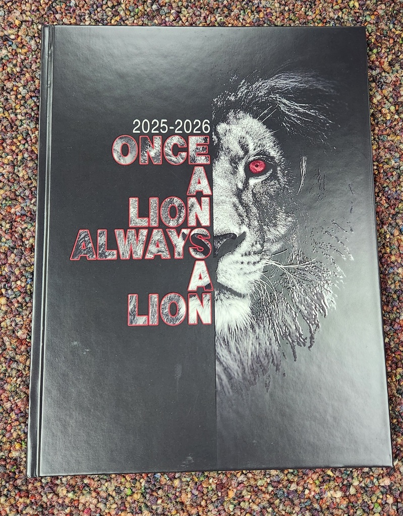 2025 2026 Edwardian yearbook cover an image of a lion with the quote "once a lion always a lion"