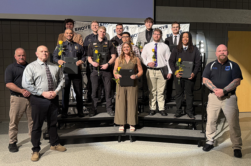 Students and staff in a posed photo