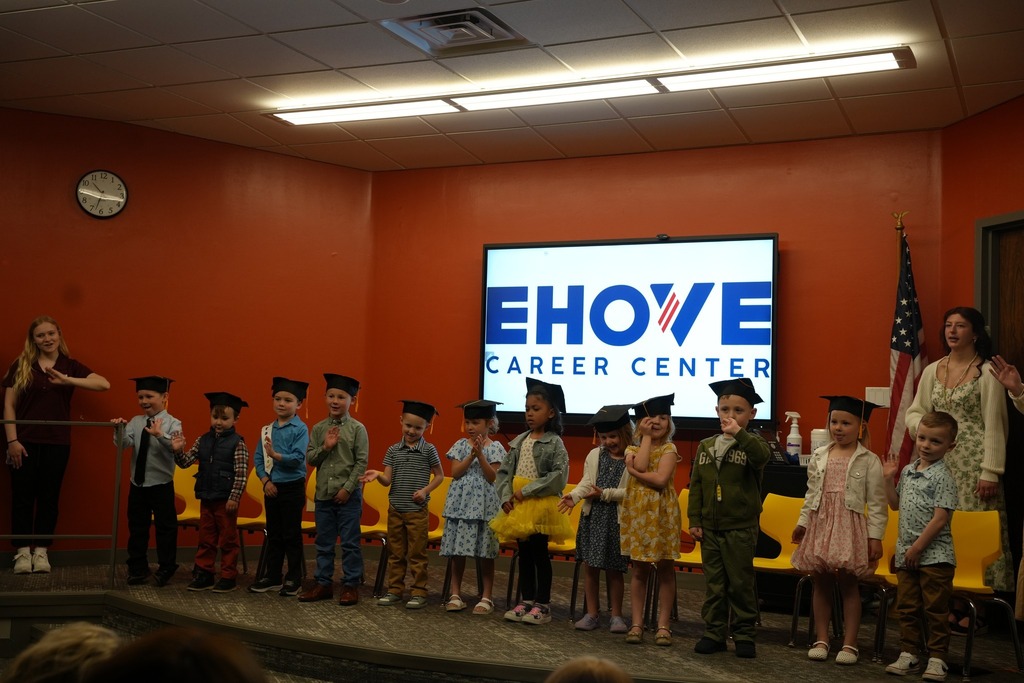 Preschoolers lined up for graduation on stage
