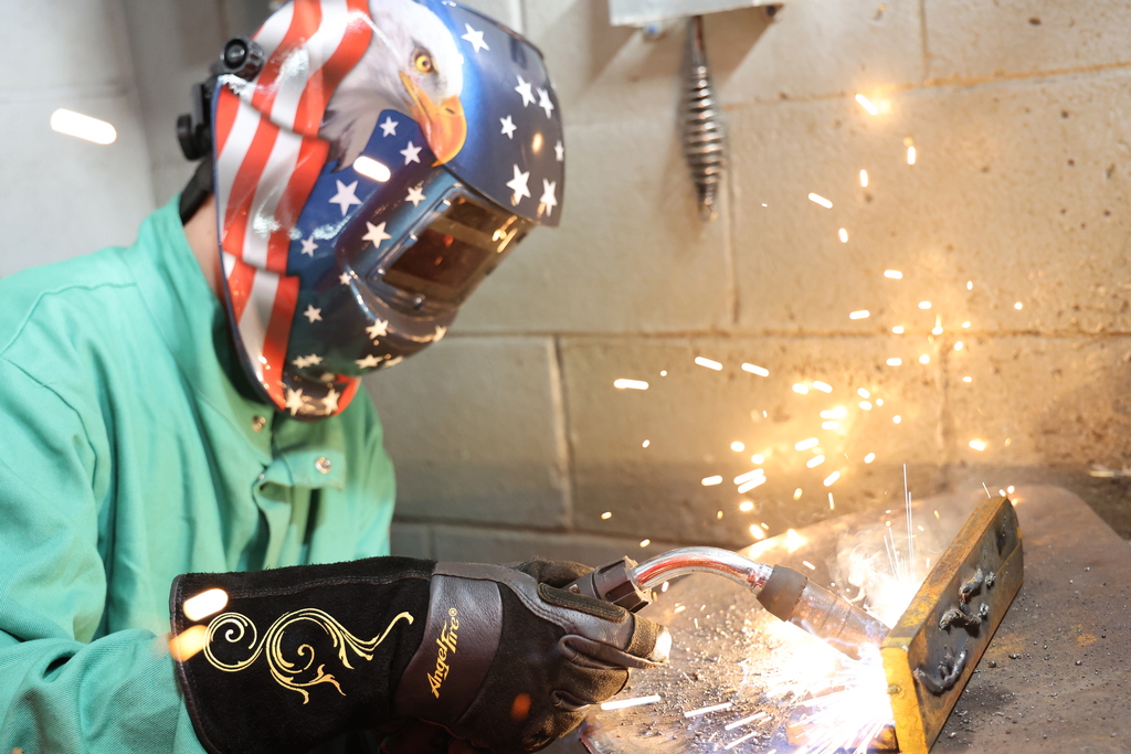 Boy welding