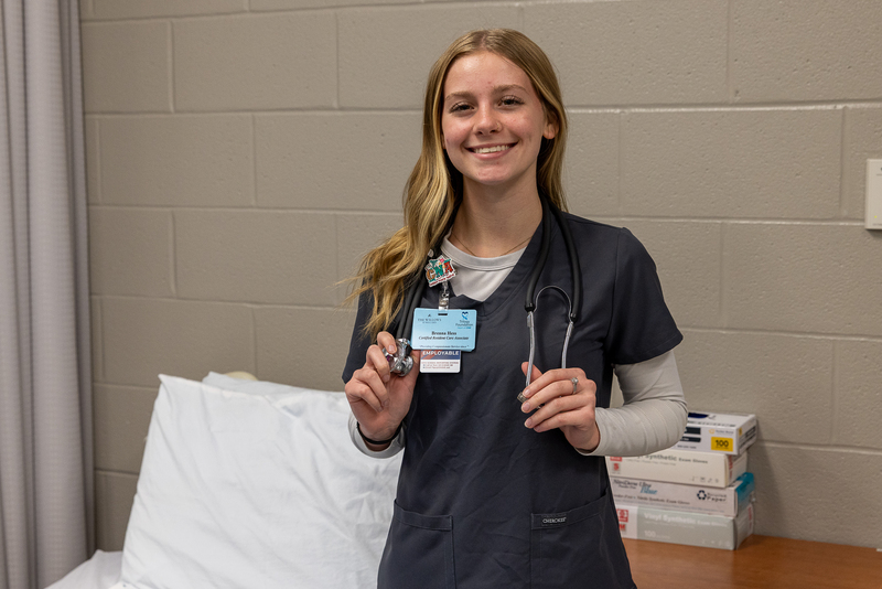 medical student holding stethoscope