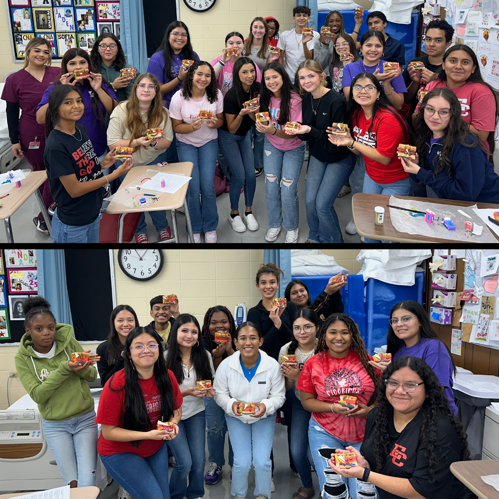 class of students showing their finished project