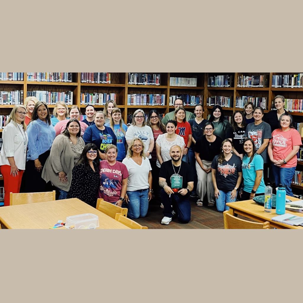 teacher posed with author