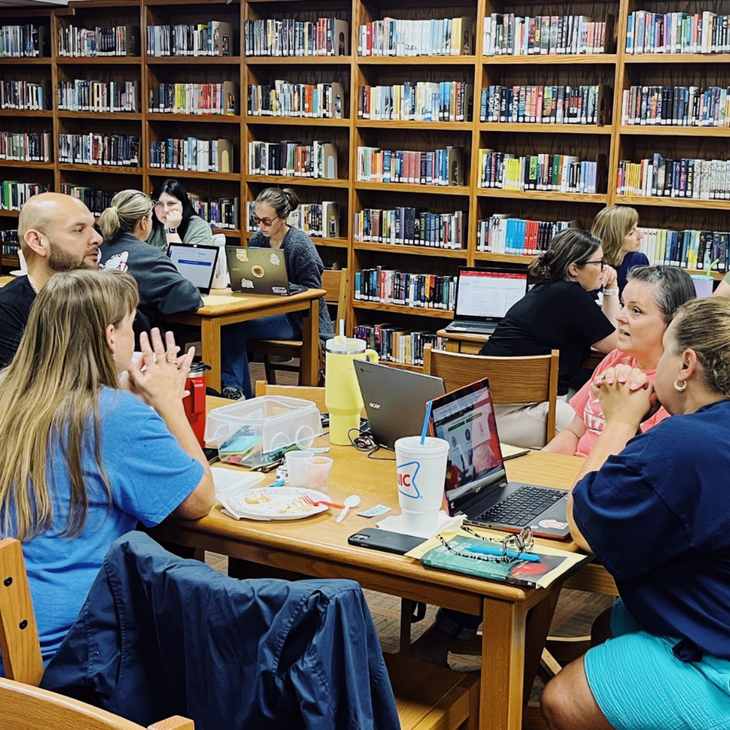 teachers discussing the book and activities