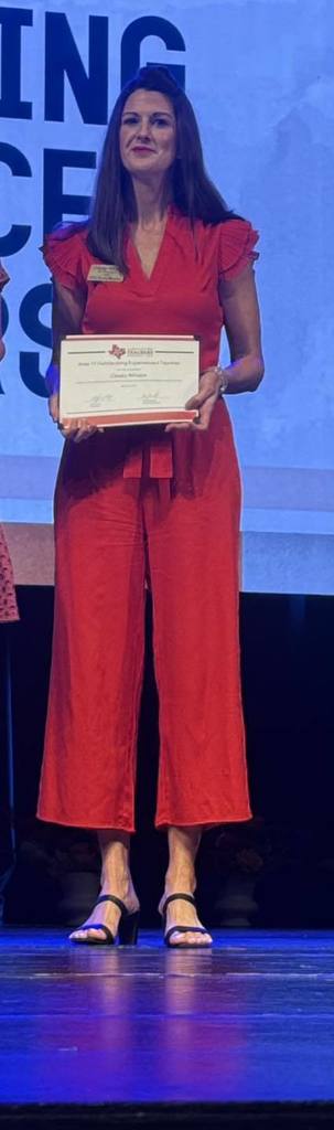 ms wilson with award