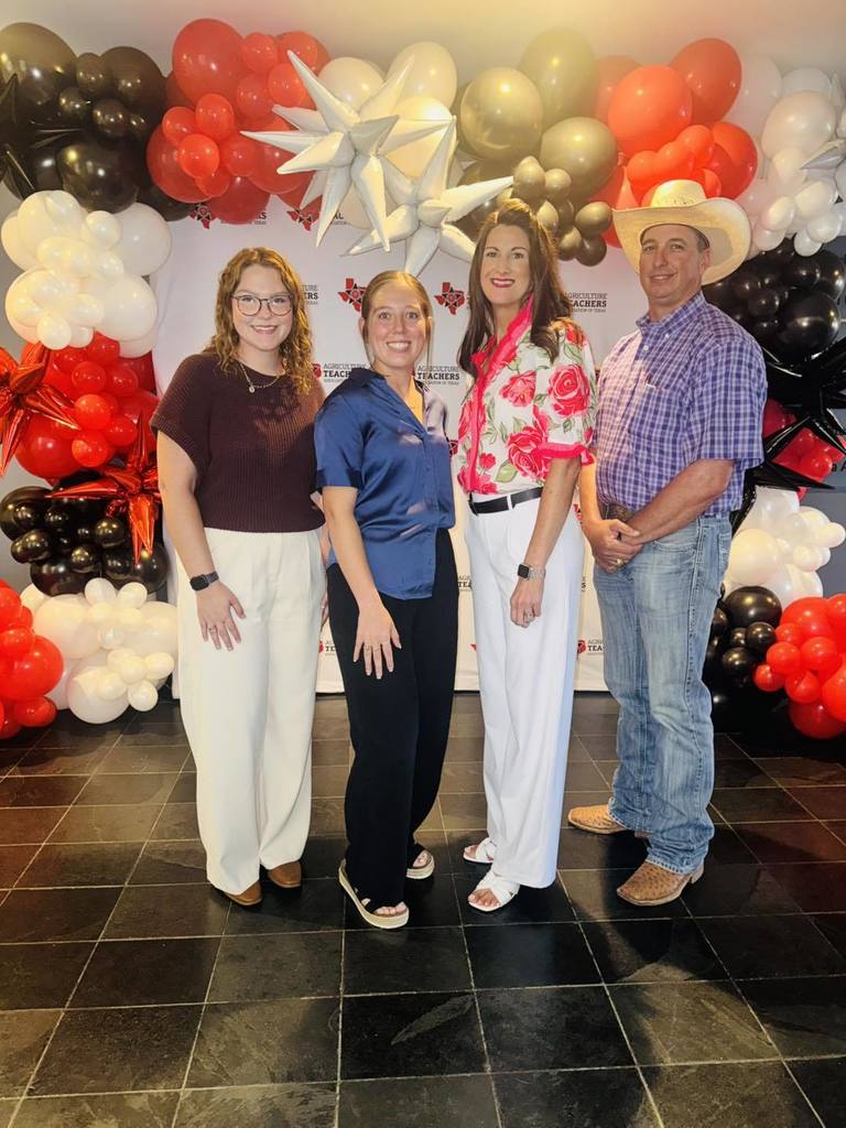 4 ag teachers posing for picture