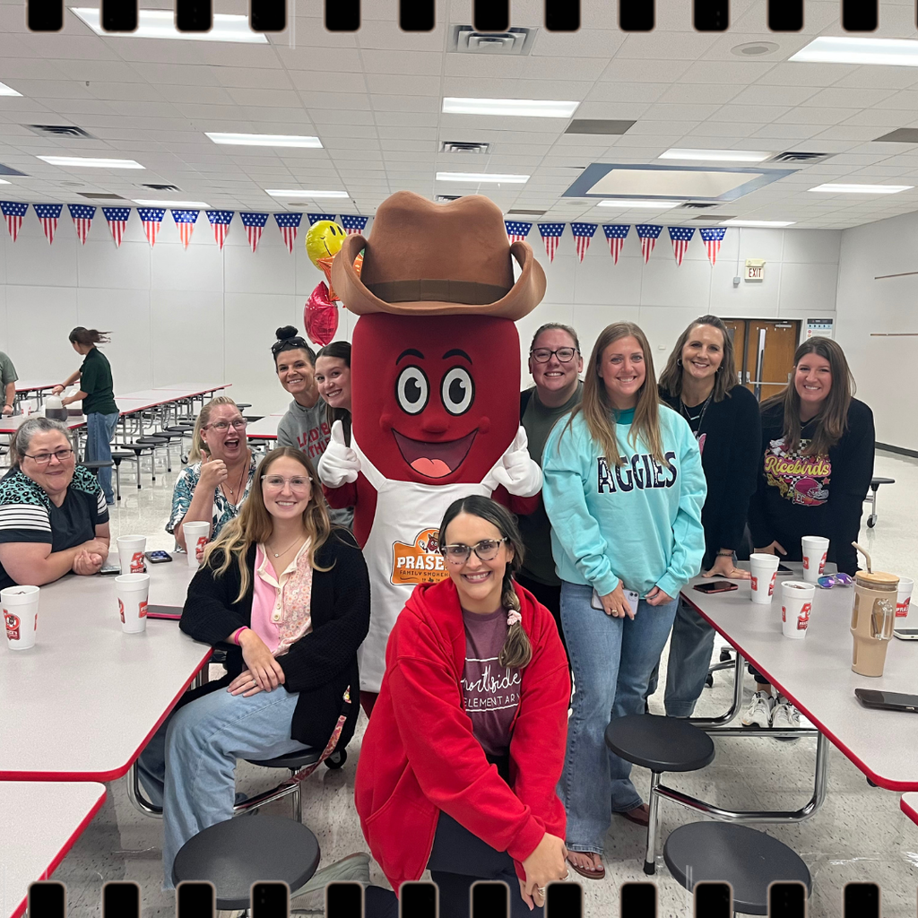 prasek's mascot with teachers and tea 