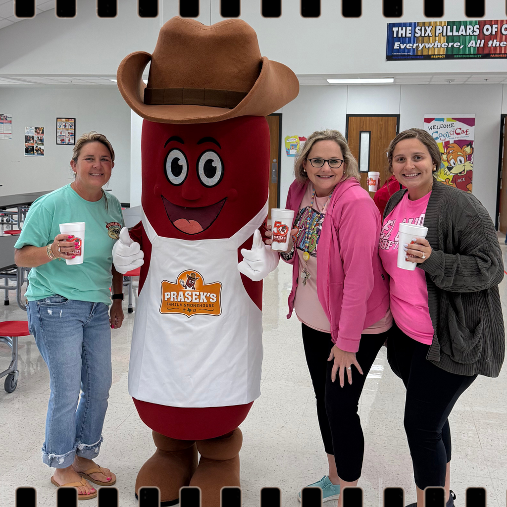 prasek's mascot with teachers and tea 
