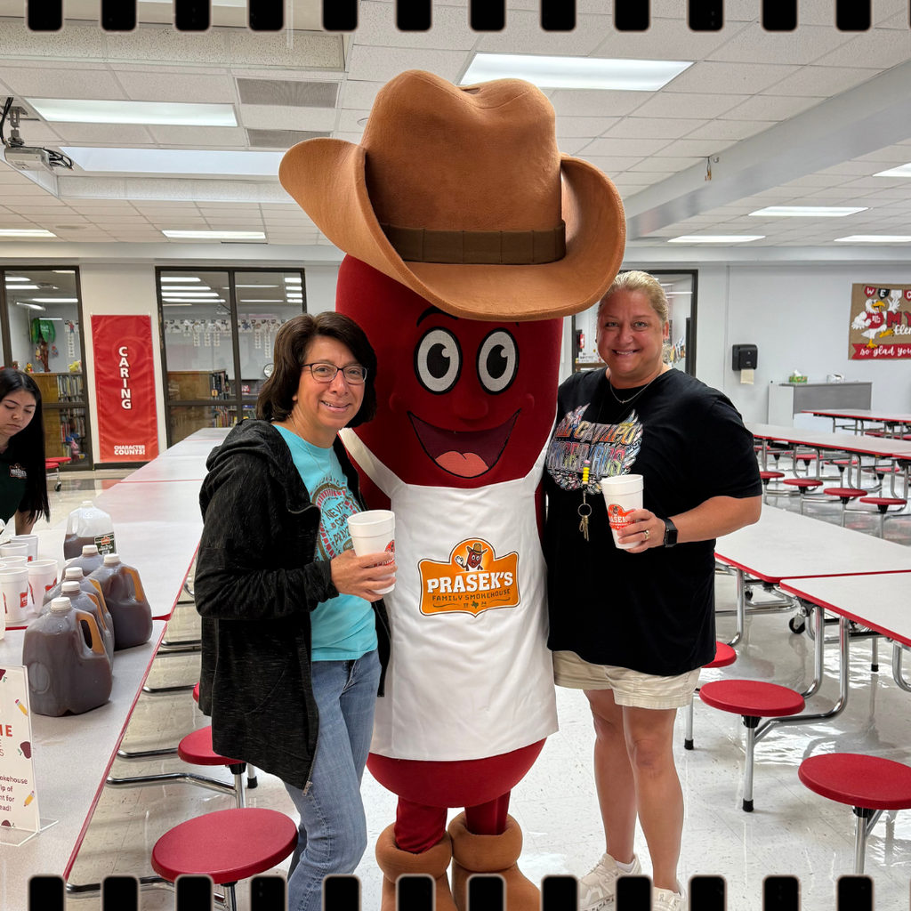 prasek's mascot with teachers and tea