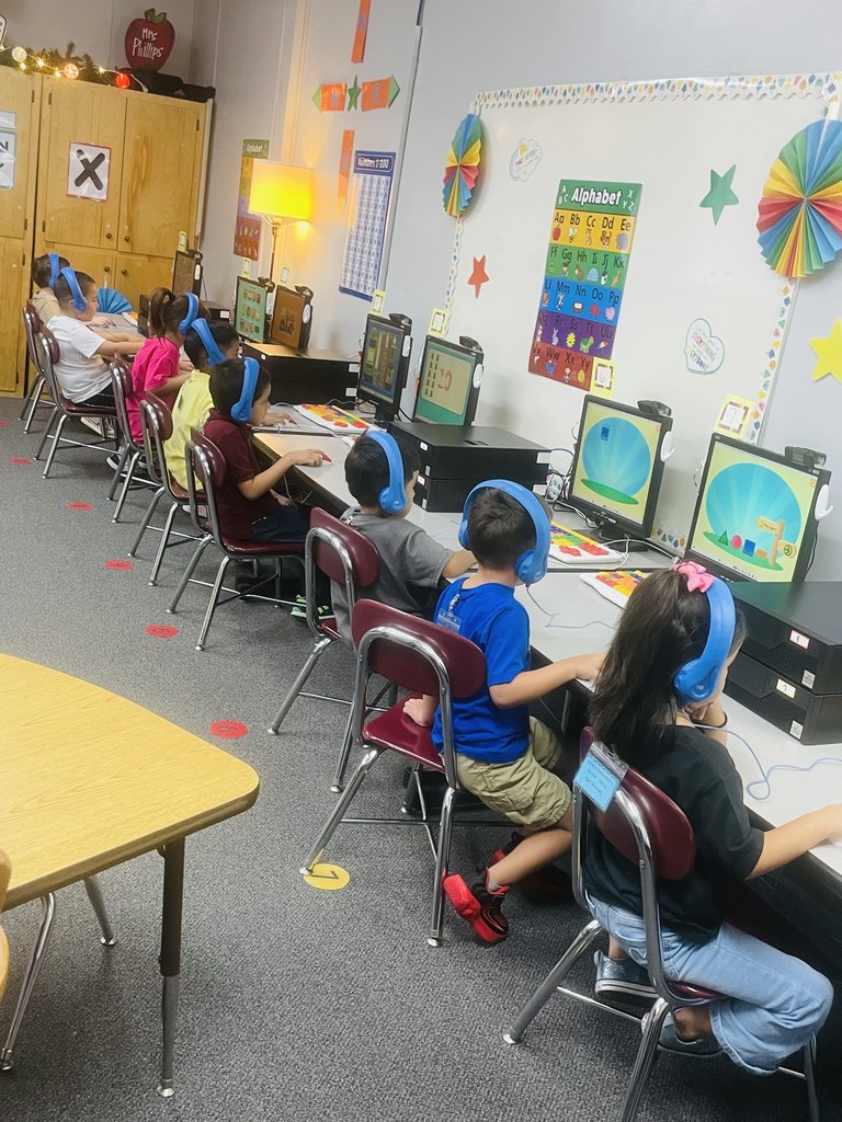 small kids at computers