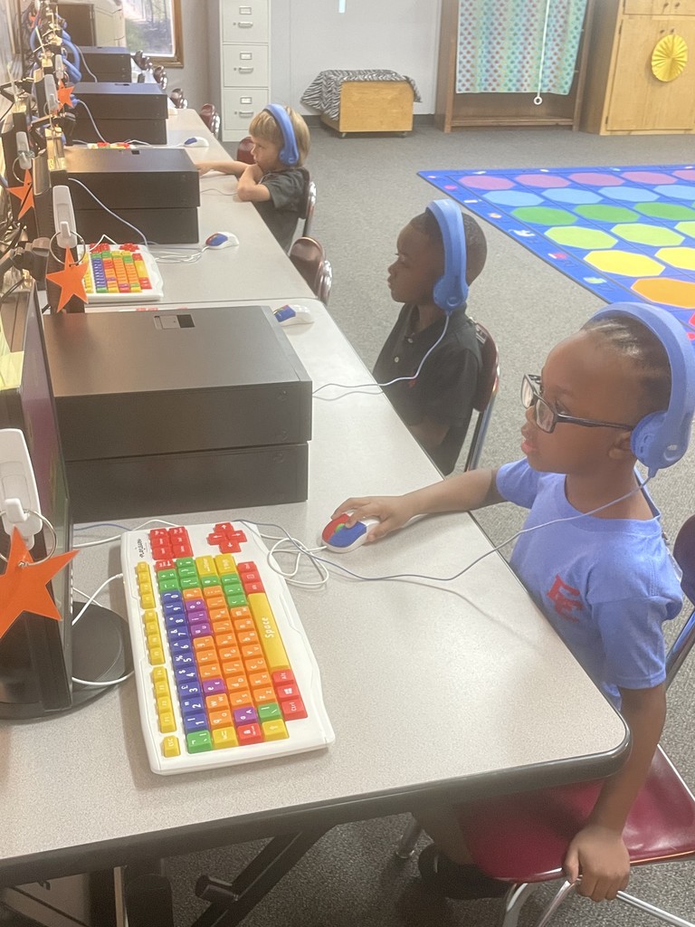small kids at computers