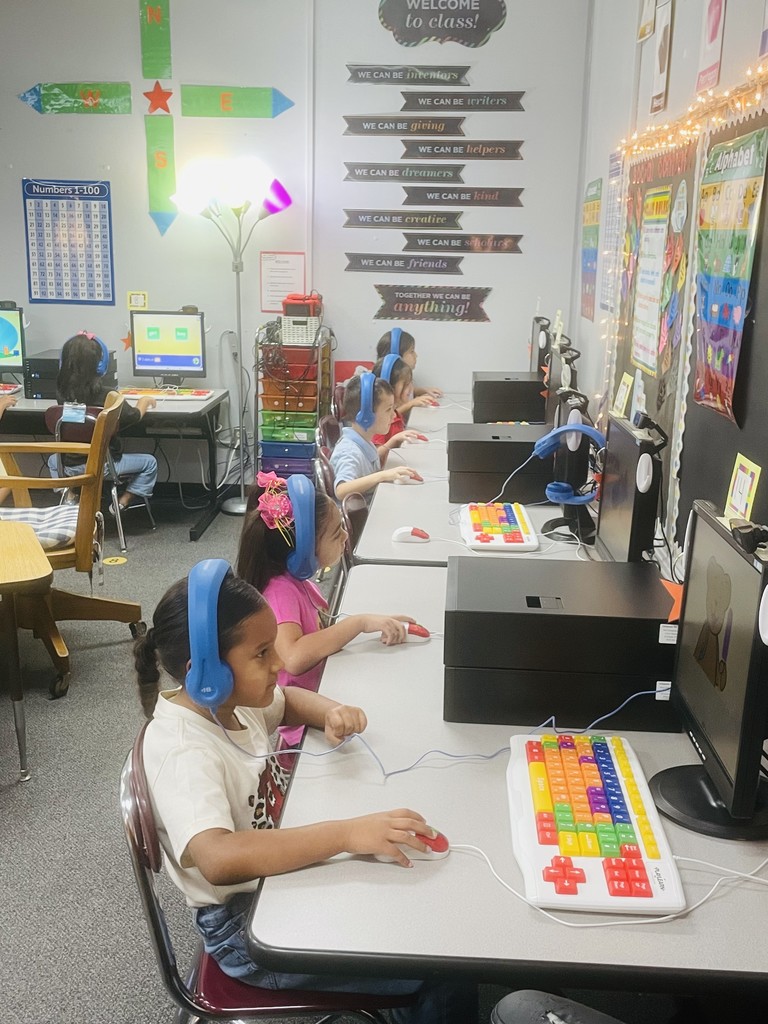 small kids at computers