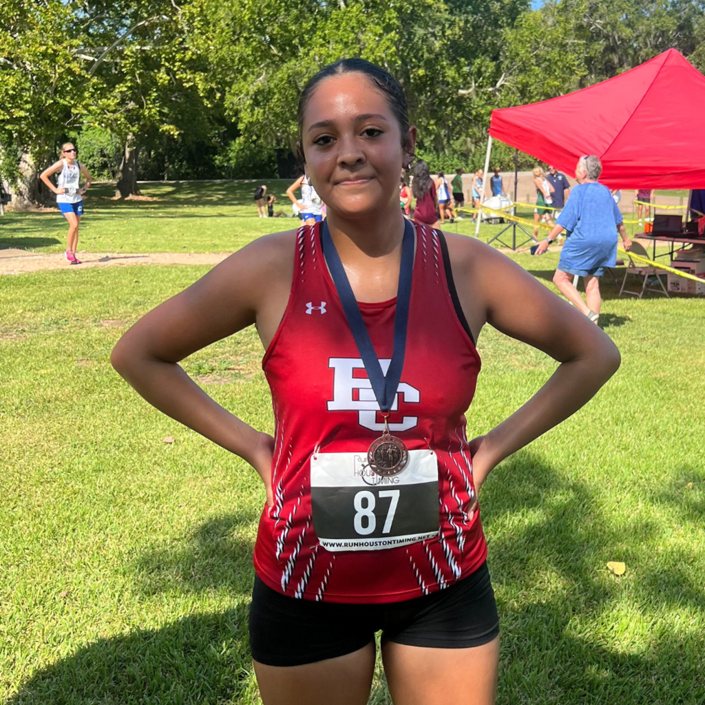 girl with medal at the meet
