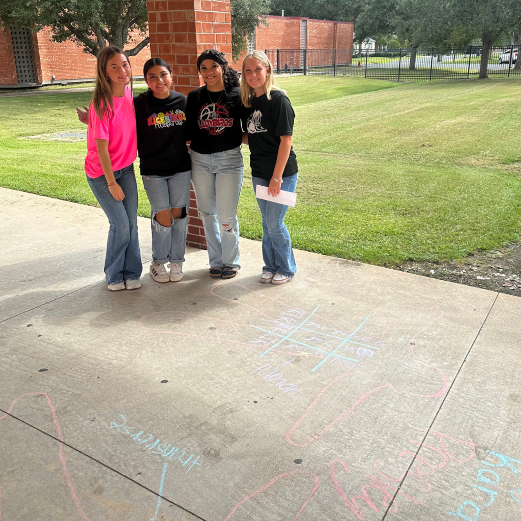 students learning terms with sidewalk chalk and lifesize drawings