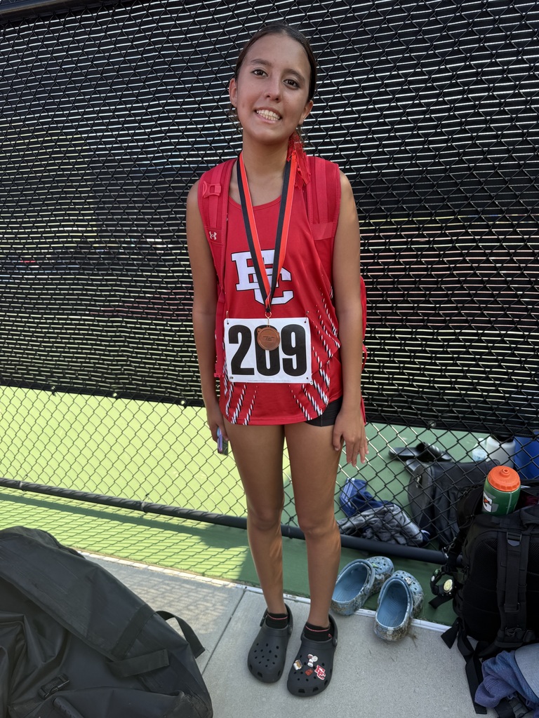 Lexi with her medal