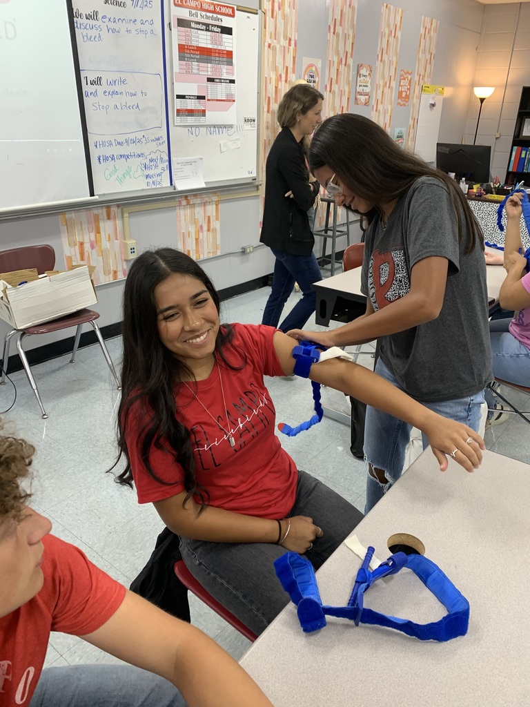 students practicing the process on a classmate (3)