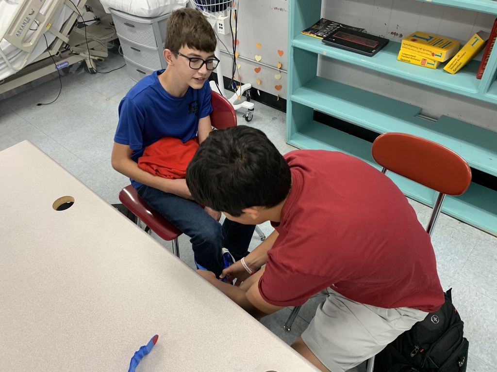students practicing the process on a classmate (7)