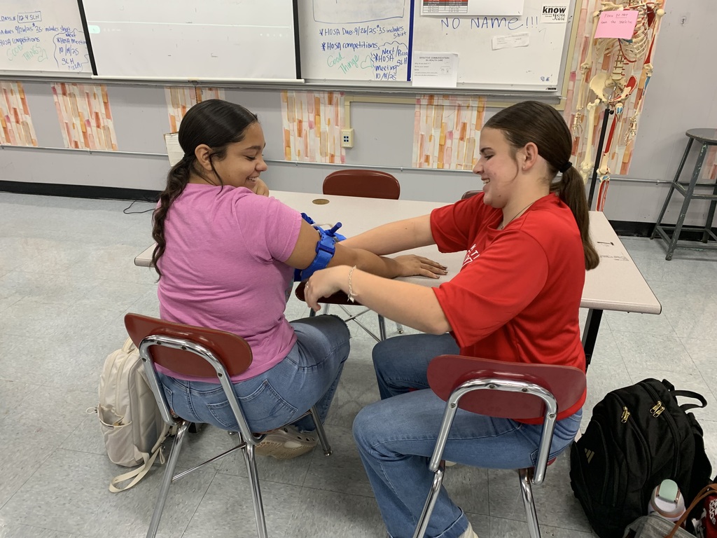 students practicing the process on a classmate (4)