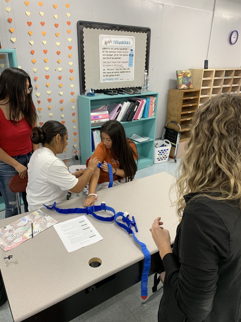 students practicing the process on a classmate (9)
