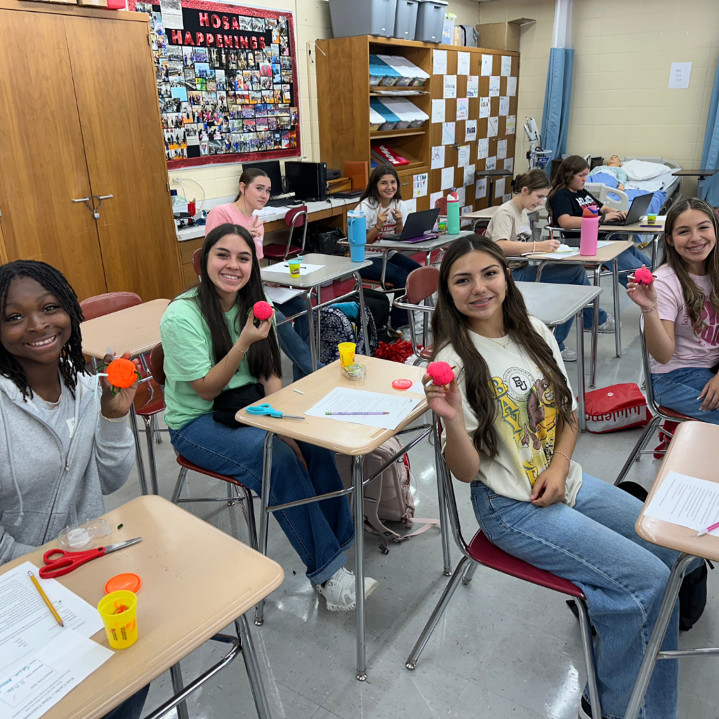 students showing off their potato