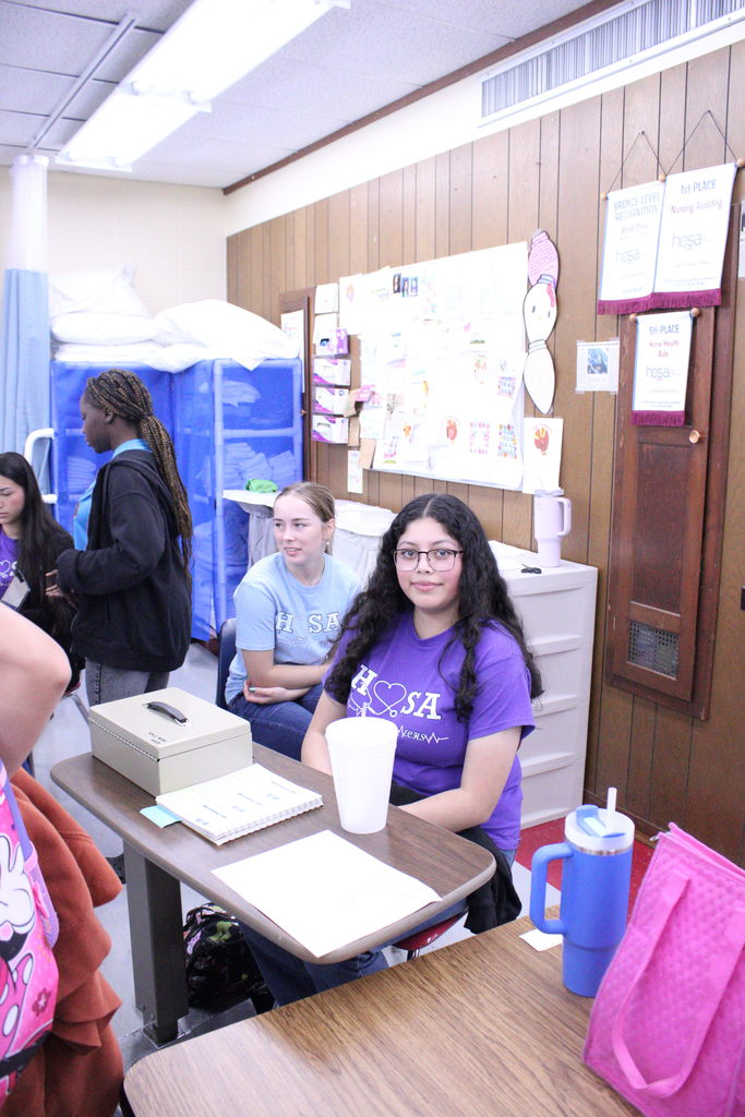 students at meeting