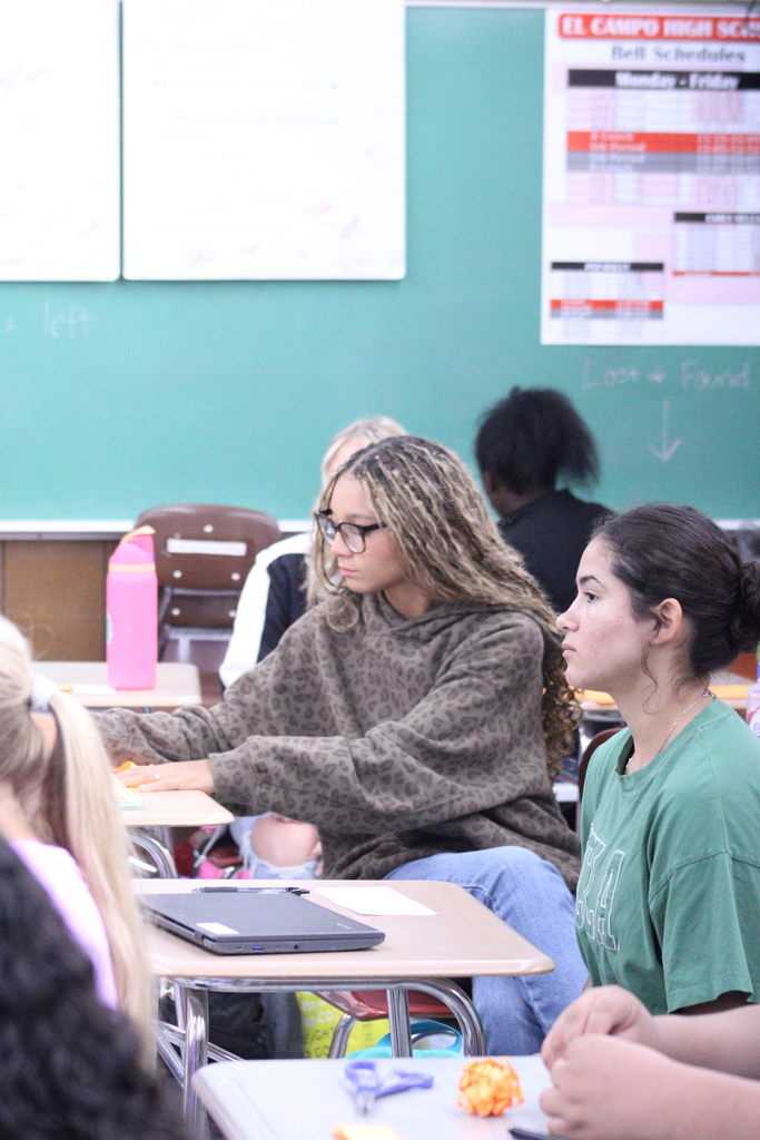 students at meeting 