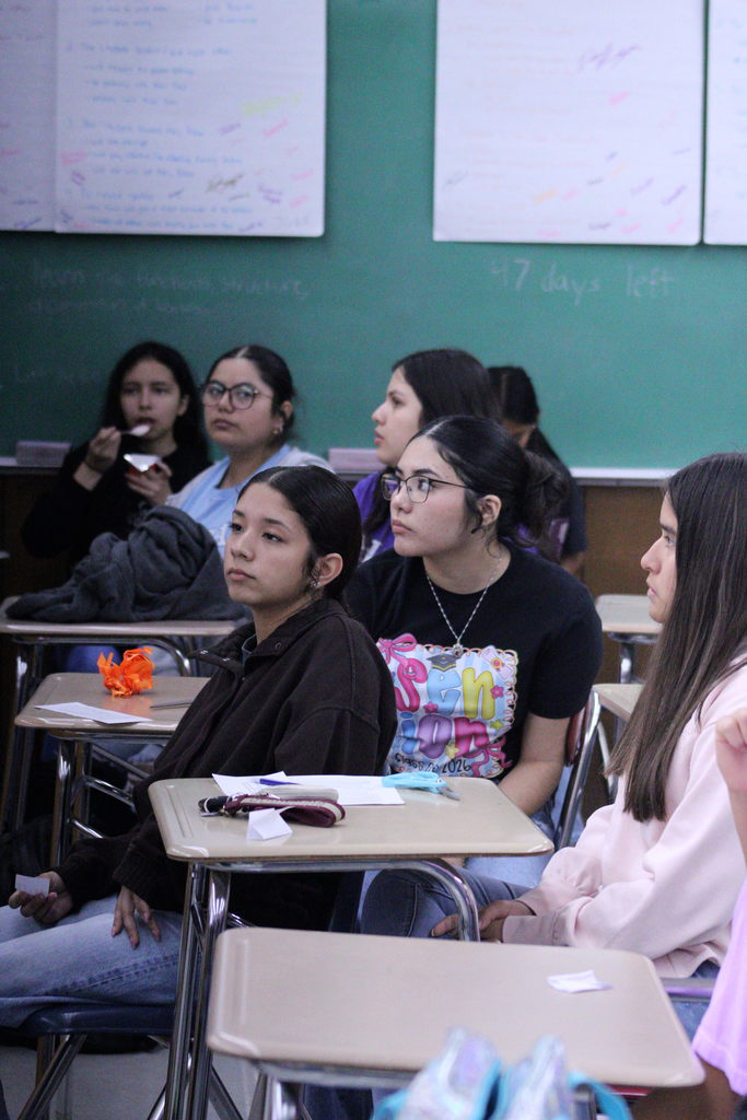 students at meeting 
