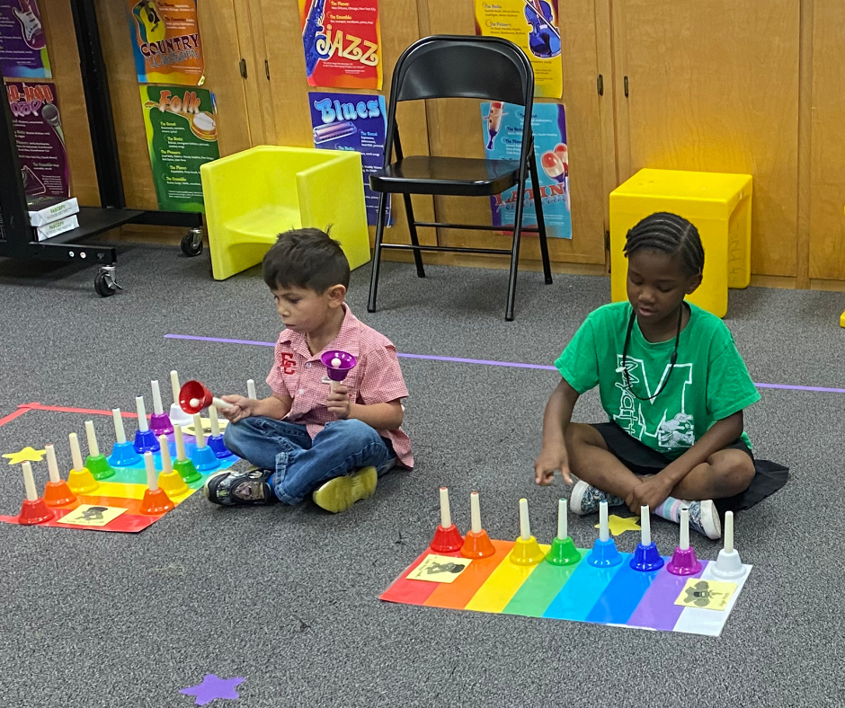 kids playing bells