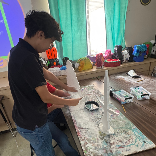 student working on 3D  cross