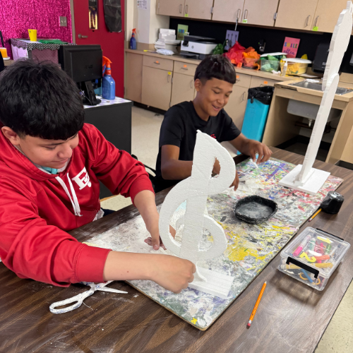 student working on 3D  music note
