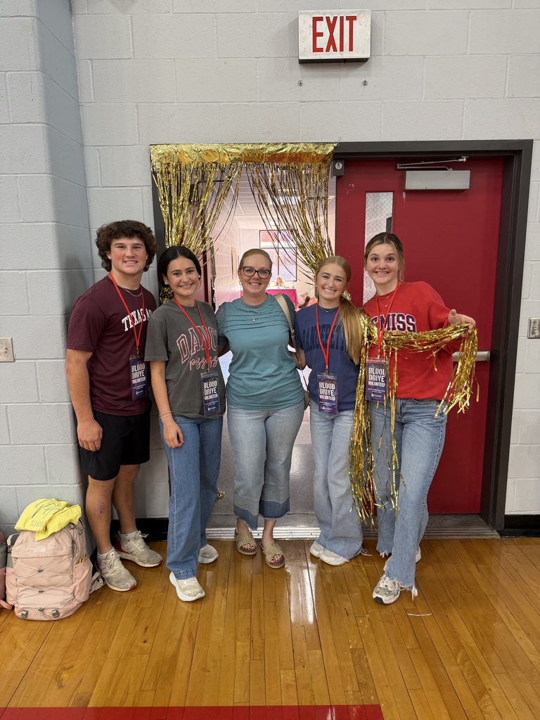 staff member with students