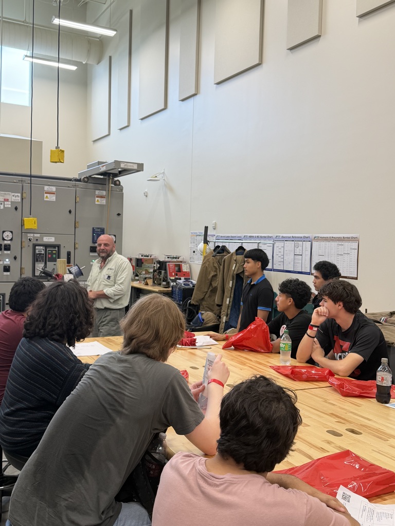 students listening to trainer