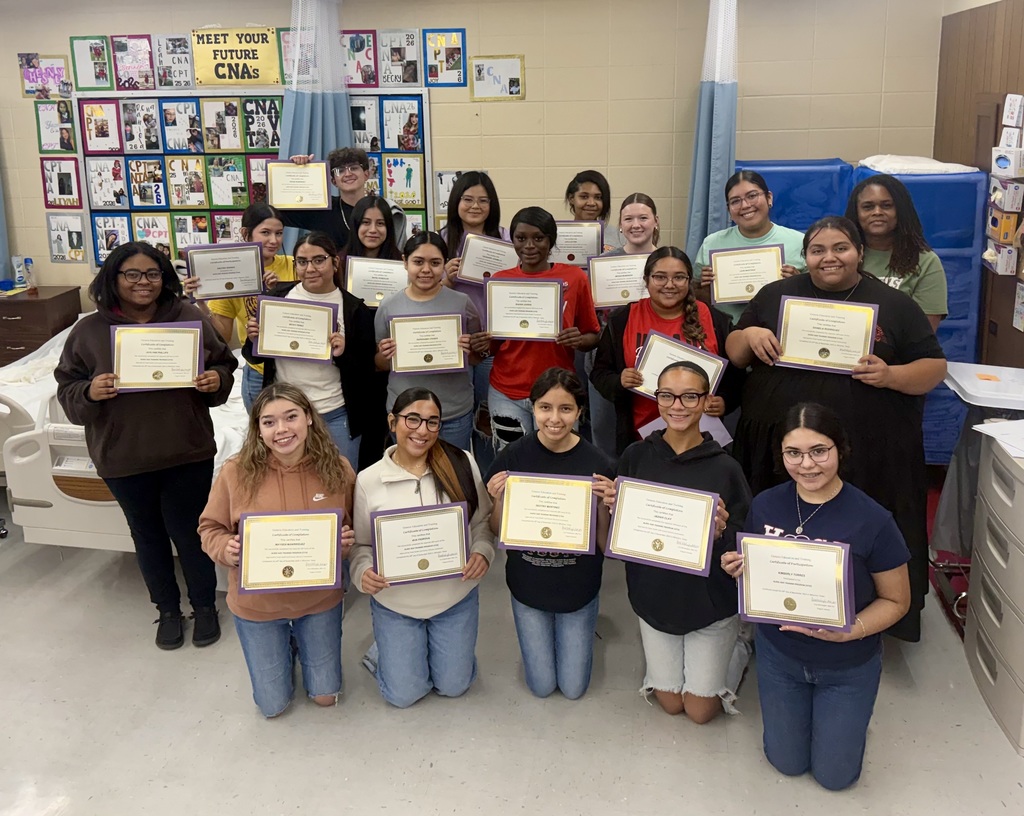 group of students with their certificates