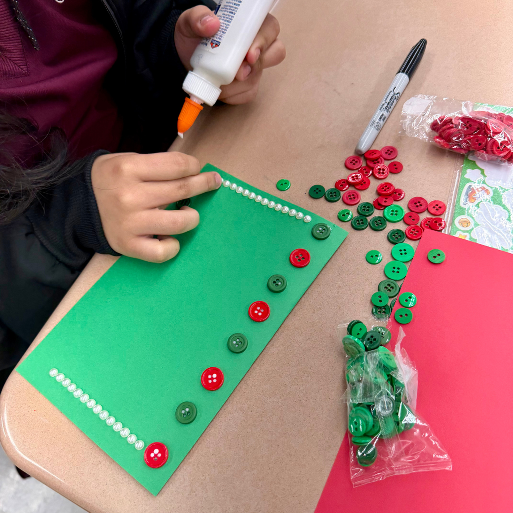 student making holiday card