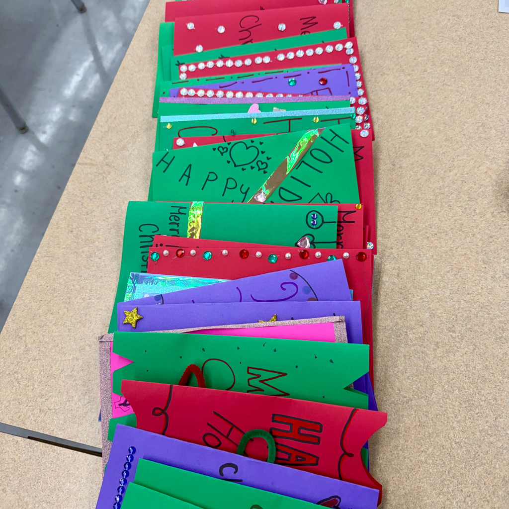 stack of homemade holiday cards 