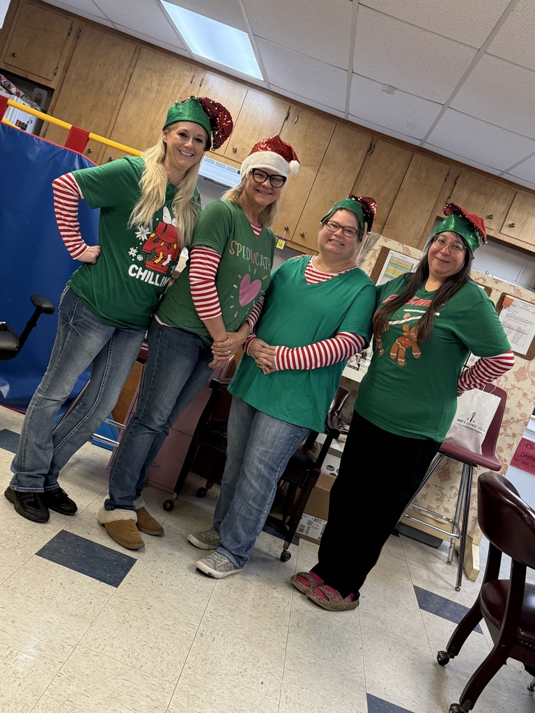 4 ladies dressed as elves in the step II class