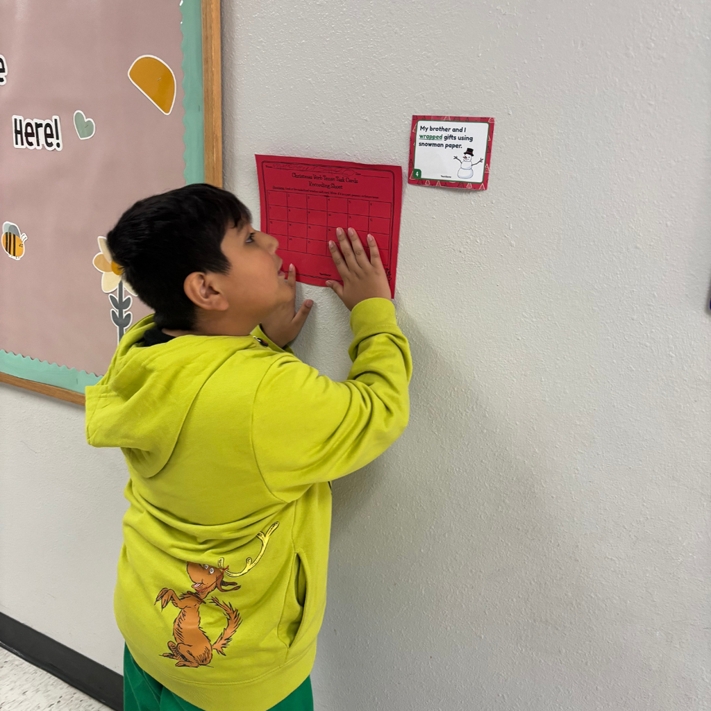 student working in hall on assignment
