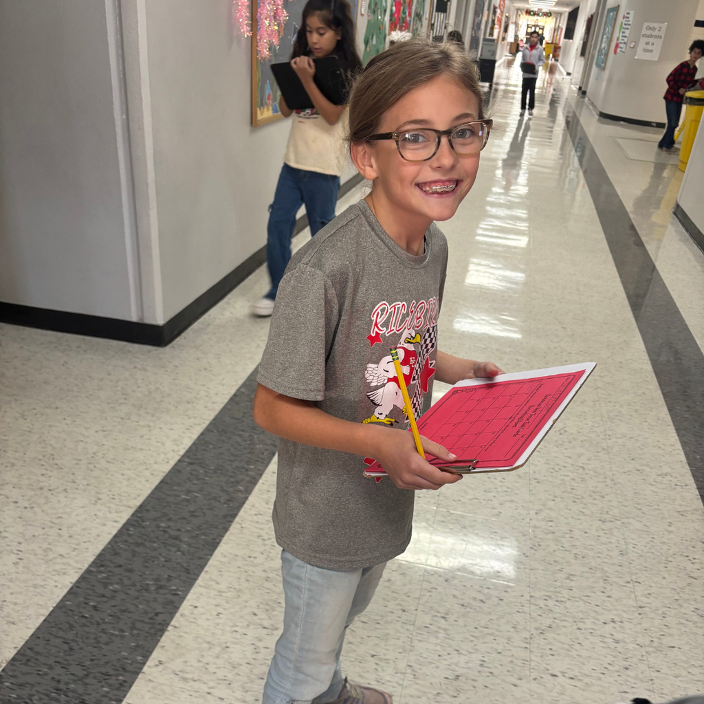 student working in hall on assignment