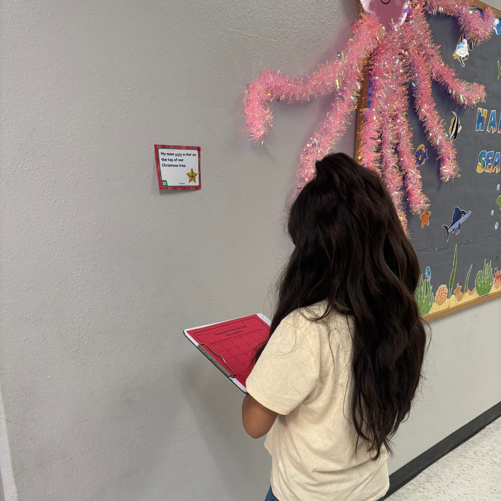 student working in hall on assignment