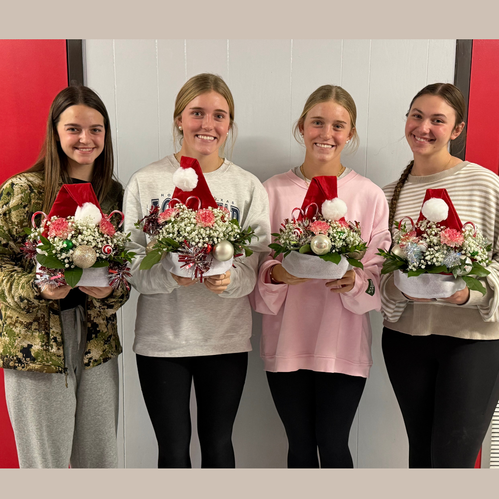 4 students showing their arrangements