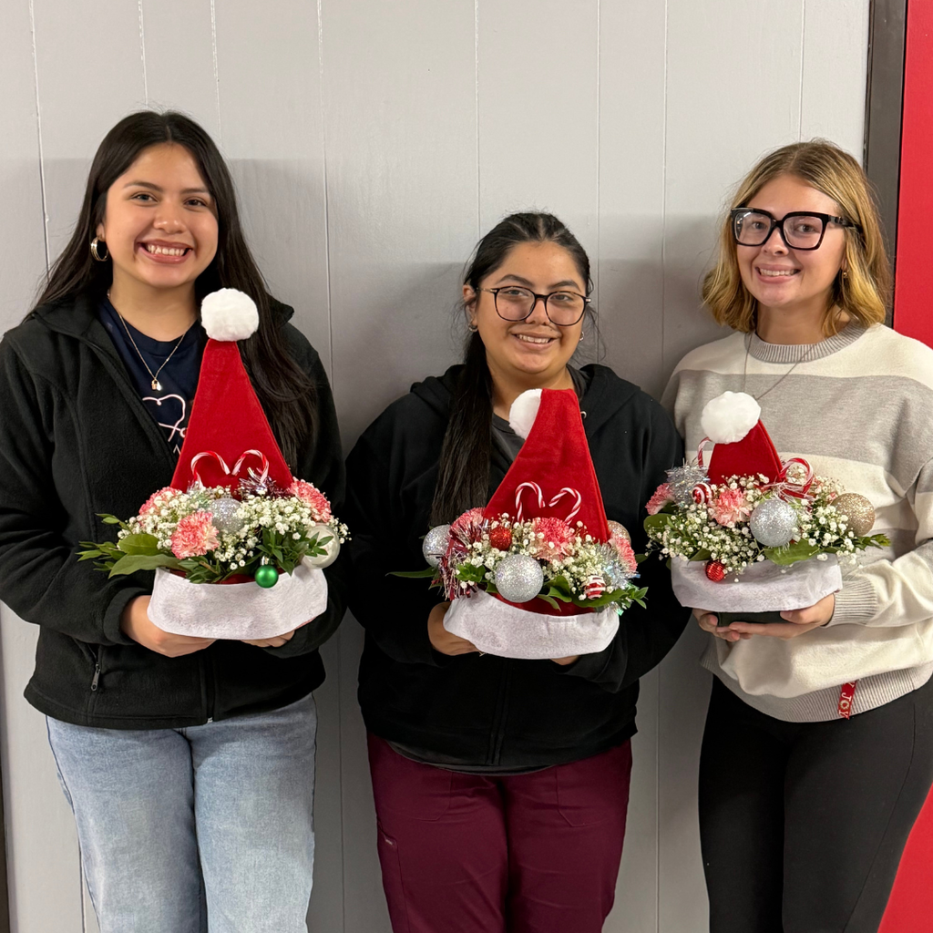 3 students showing their arrangements