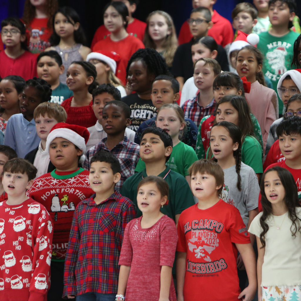 students singing at program
