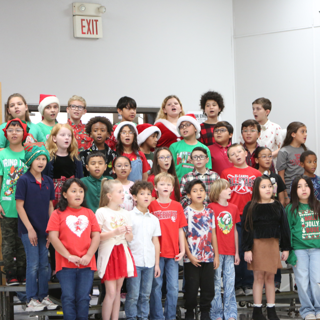 students singing at program