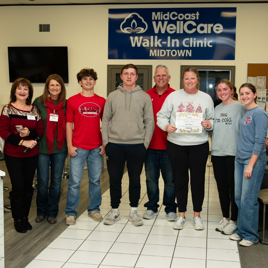 blessing cup presenting award to coaches and athletes