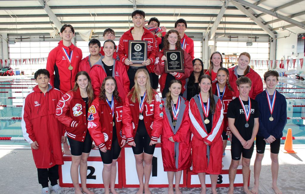 boys and girls teams on podium with plaque by the pool