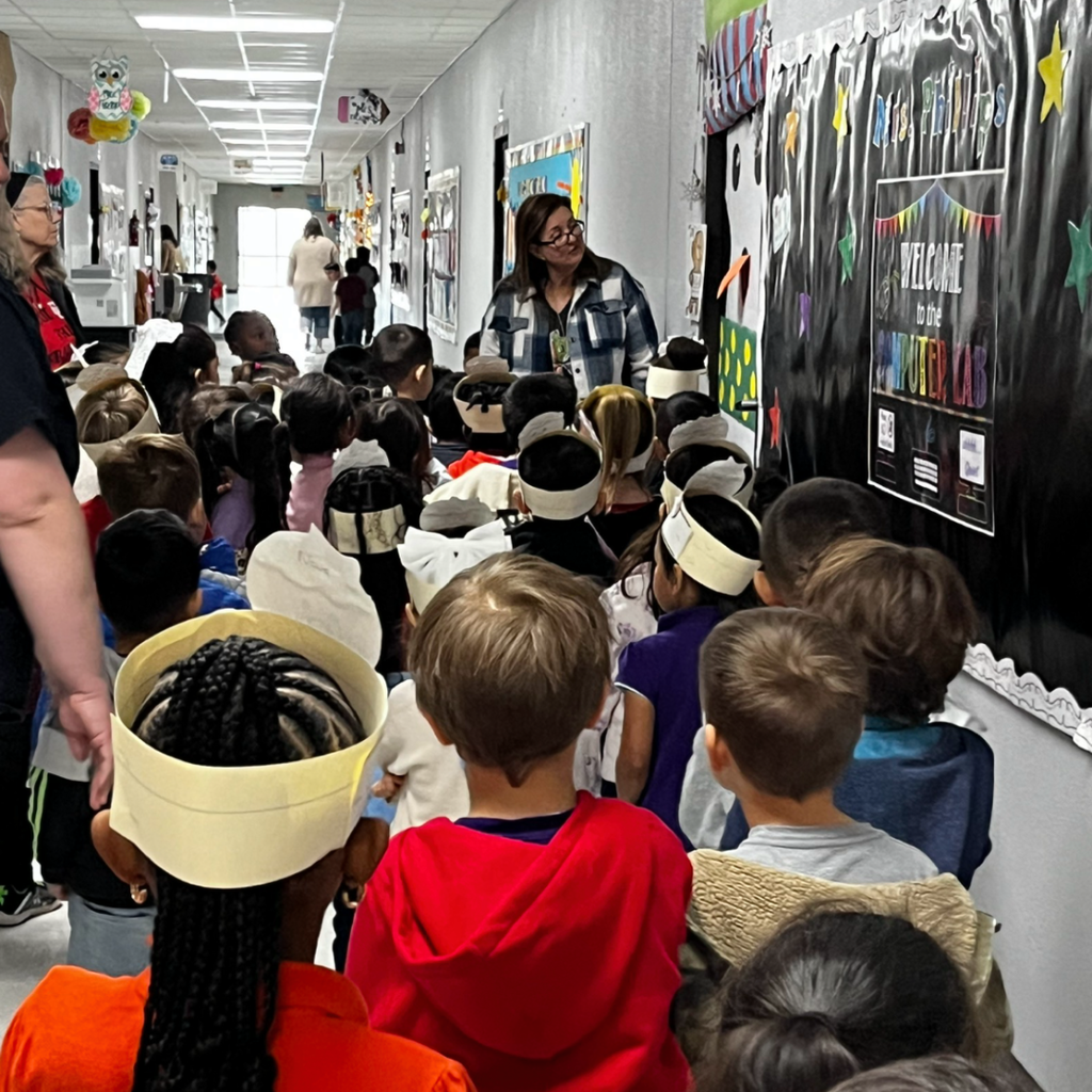 kids in hall looking for the ginger bread man